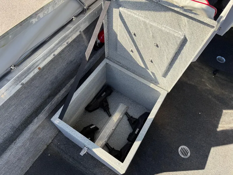 Slide: The Image of Interior of a 1987 Duckworth Pro Steelhead boat with seating and a fire extinguisher. - 16