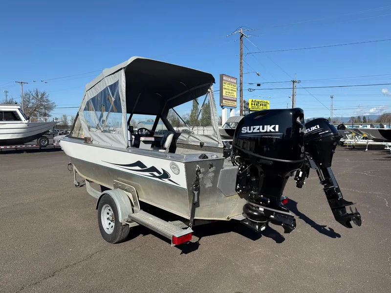 Slide: The Image of 1987 Duckworth Pro Steelhead boat with Mercury 90 FourStroke engine on trailer. - 3