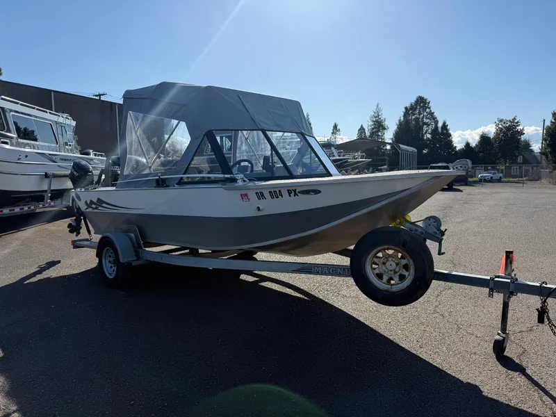 Slide: The Image of 1987 Duckworth Pro Steelhead boat interior with seating and navigation equipment. - 8