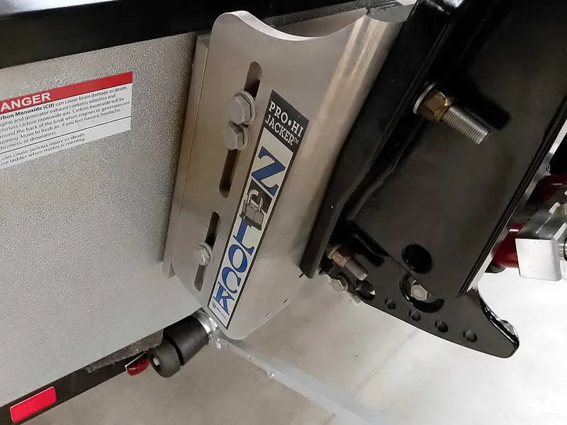 Slide: The Image of Triton 206 Allure 2021 boat trailer with Pro Hi Jacker mount detail. - 14