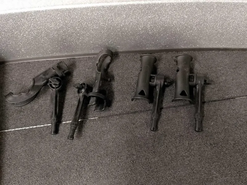 Slide: The Image of Fishing rod holders on a 2021 Triton 206 Allure boat deck. - 20