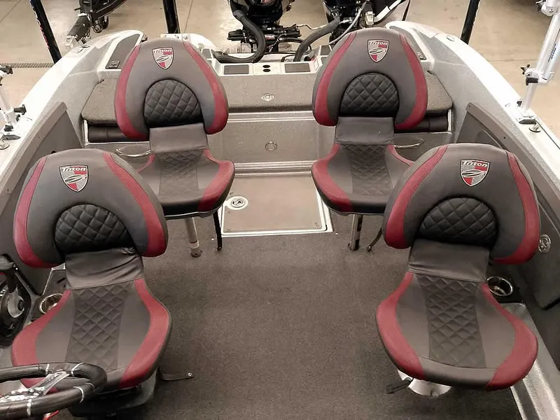 Slide: The Image of 2021 Triton 206 Allure boat interior with four cushioned seats. - 24
