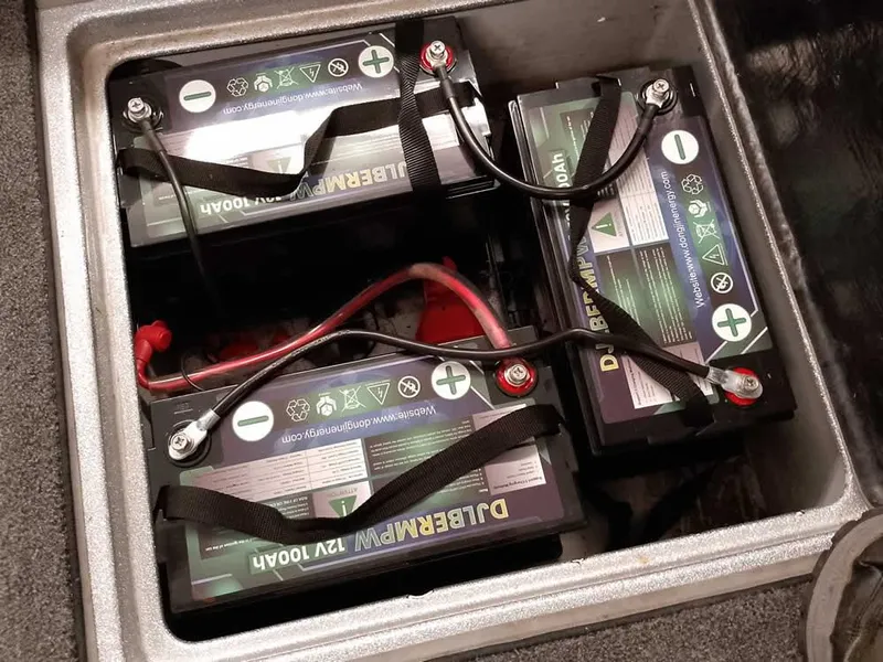 Slide: The Image of Three 12V batteries in a Triton 206 Allure boat, 2021 model. - 34