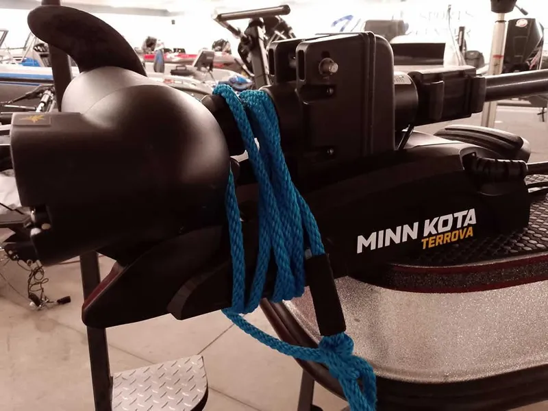 Slide: The Image of Minn Kota Terrova motor on 2021 Triton 206 Allure boat with blue rope. - 9