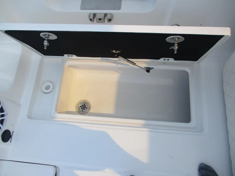 Slide: The Image of Open storage compartment on 2025 Sea Fox 288 Traveler boat. - 10