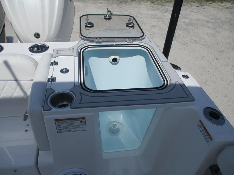 Slide: The Image of 2025 Sea Fox 288 Traveler boat livewell with open lid, showcasing interior design. - 13