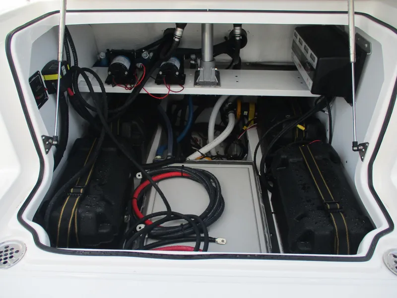 Slide: The Image of Engine compartment of 2025 Sea Fox 288 Traveler, showcasing wiring and components. - 14