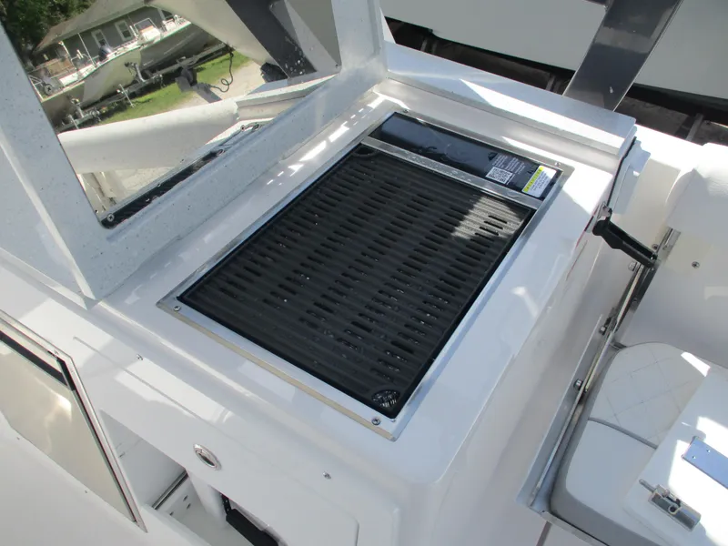 Slide: The Image of Built-in grill on 2025 Sea Fox 288 Traveler boat deck. - 19