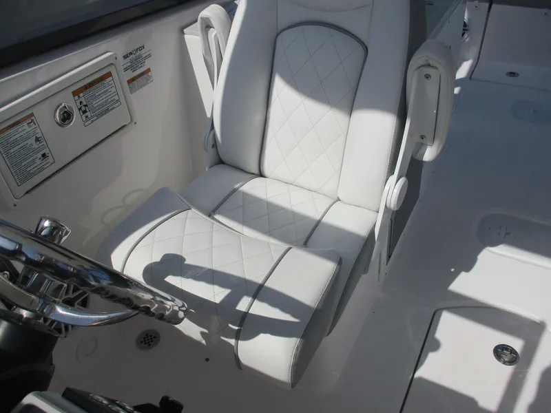 Slide: The Image of Luxurious seating in 2025 Sea Fox 288 Traveler boat with quilted white upholstery. - 23