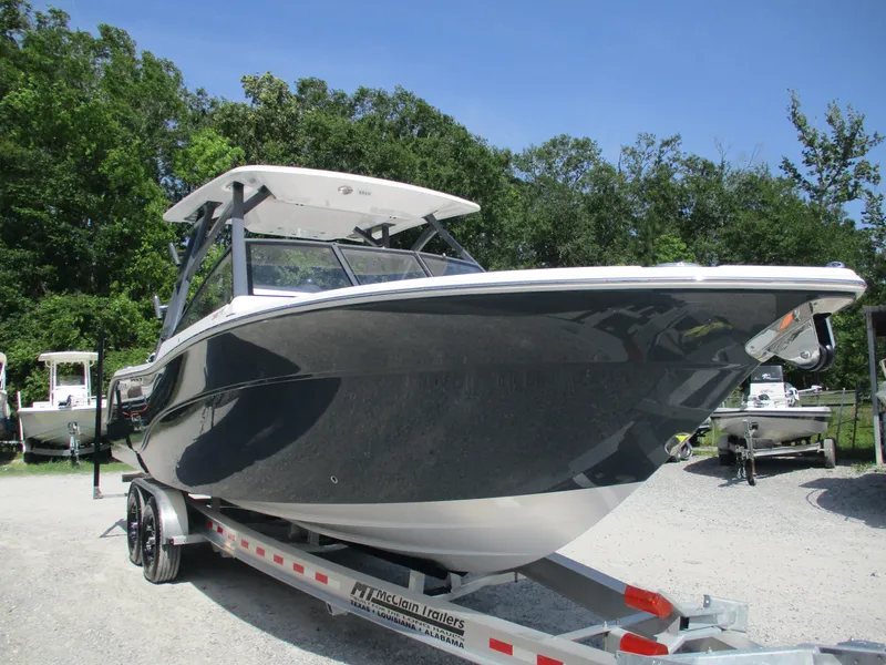 Slide: The Image of 2025 Sea Fox 288 Traveler boat on trailer, parked outdoors. - 5
