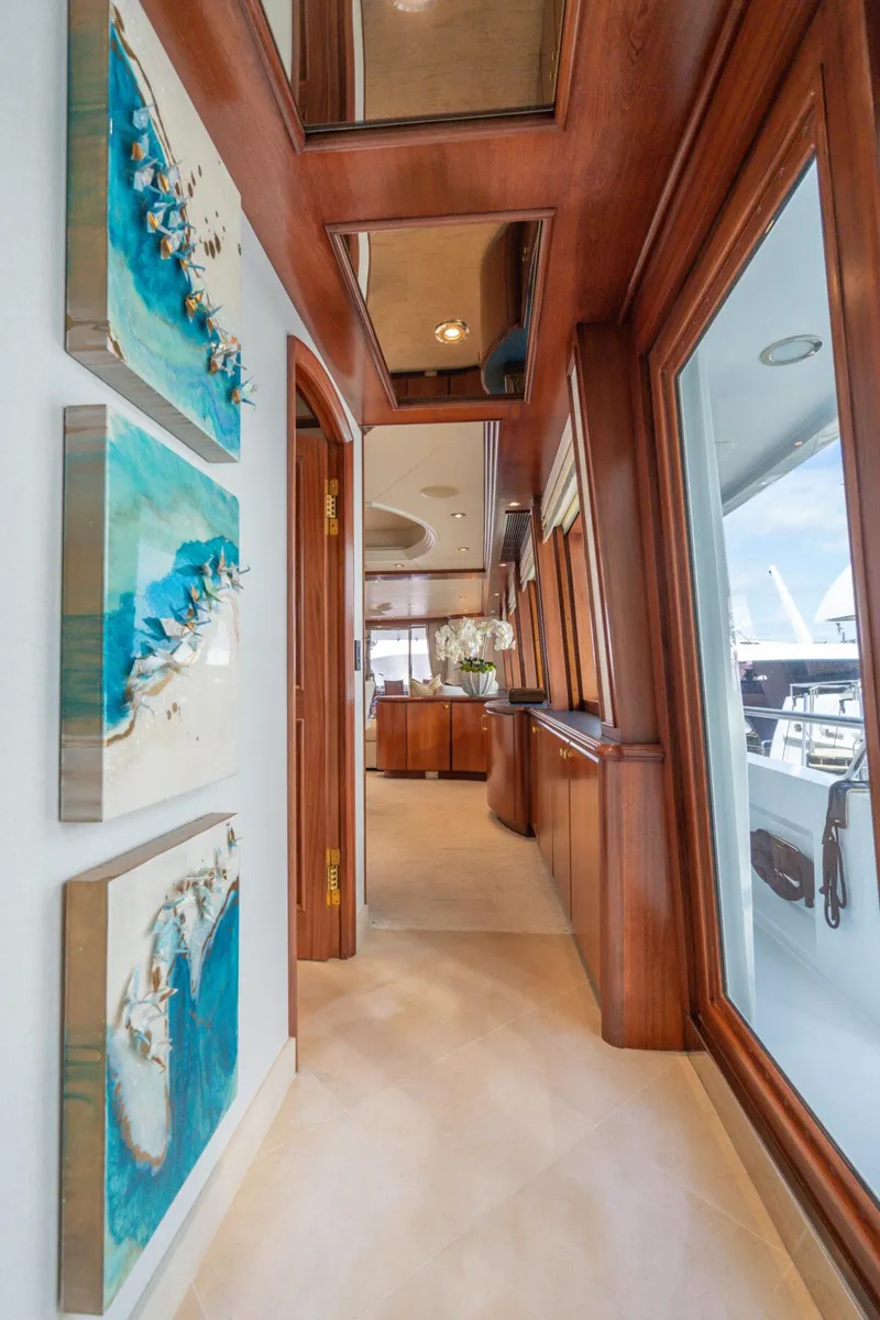 Slide: The Image of Luxurious hallway in 2004 Crescent Raised Pilothouse yacht with elegant wood finishes. - 10