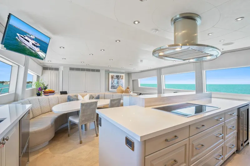 Slide: The Image of Luxurious Crescent Raised Pilothouse yacht interior with modern kitchen and ocean views, 2004 model. - 14