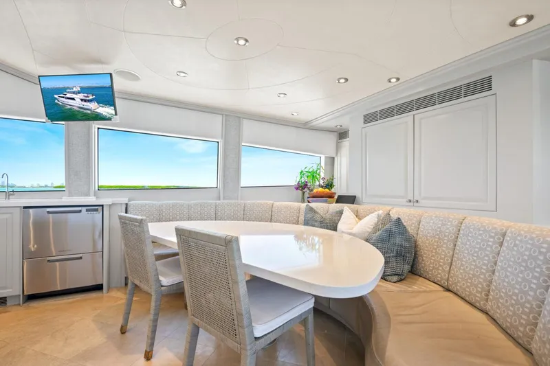 Slide: The Image of Luxurious Crescent Raised Pilothouse 2004 yacht interior with elegant dining area and modern decor. - 18