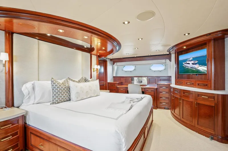 Slide: The Image of Luxurious bedroom in 2004 Crescent Raised Pilothouse yacht with elegant wood finishes. - 27