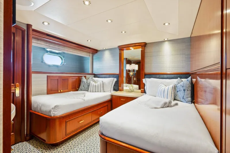 Slide: The Image of Luxurious twin bedroom in 2004 Crescent Raised Pilothouse yacht with elegant wood finishes. - 36