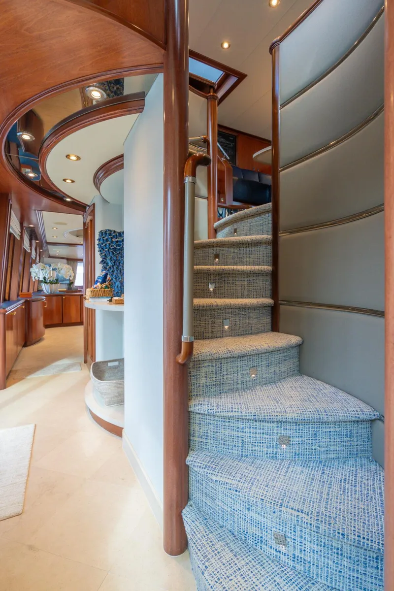 Slide: The Image of Luxurious interior of 2004 Crescent Raised Pilothouse yacht with elegant spiral staircase. - 38