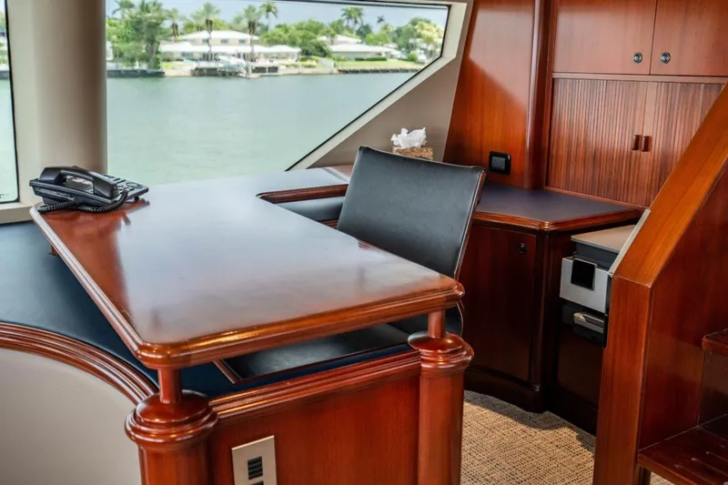 Slide: The Image of Luxurious Crescent Raised Pilothouse yacht interior with elegant wood finish, 2004 model. - 40