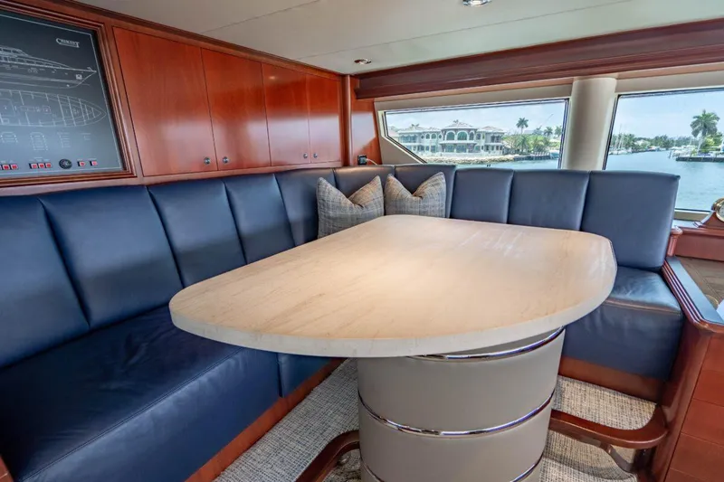 Slide: The Image of Luxurious Crescent Raised Pilothouse 2004 yacht interior with elegant dining area and waterfront view. - 41