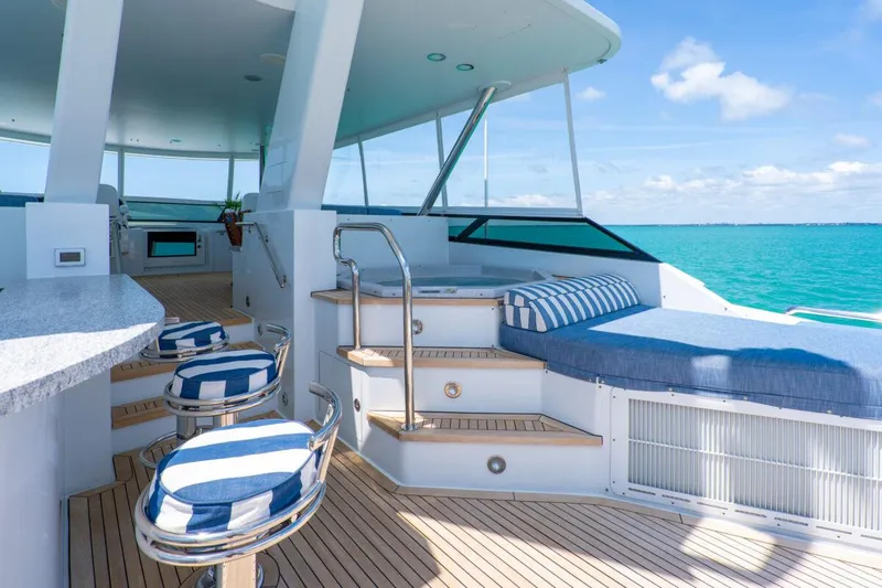 Slide: The Image of Luxurious 2004 Crescent Raised Pilothouse yacht deck with seating and ocean view. - 48