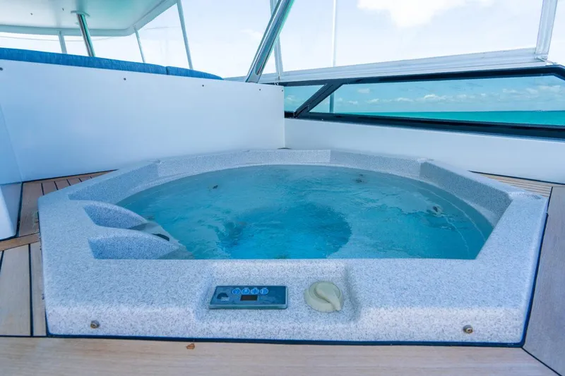 Slide: The Image of Luxurious hot tub on 2004 Crescent Raised Pilothouse yacht deck with ocean view. - 49