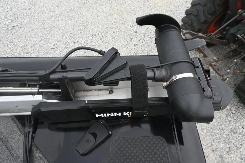 Slide: The Image of Minn Kota trolling motor on 2016 Tracker Pro Team™ 195 TXW boat, gravel background. - 2