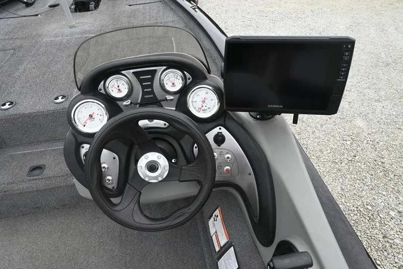 Slide: The Image of 2016 Tracker Pro Team™ 195 TXW dashboard with steering wheel and Garmin display. - 6