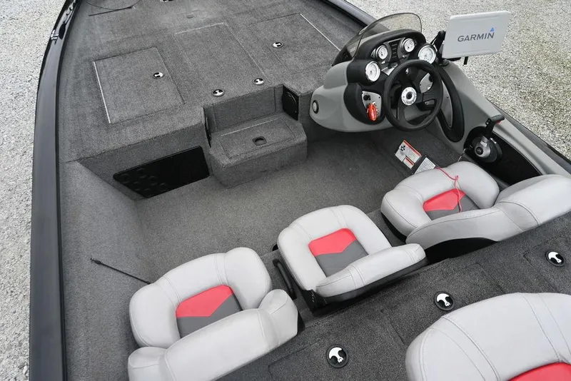Slide: The Image of 2016 Tracker Pro Team™ 195 TXW boat interior with steering console and seating. - 8