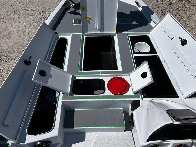 Slide: The Image of 2025 Xpress H20C Crappie boat interior with open storage compartments and hatches. - 9