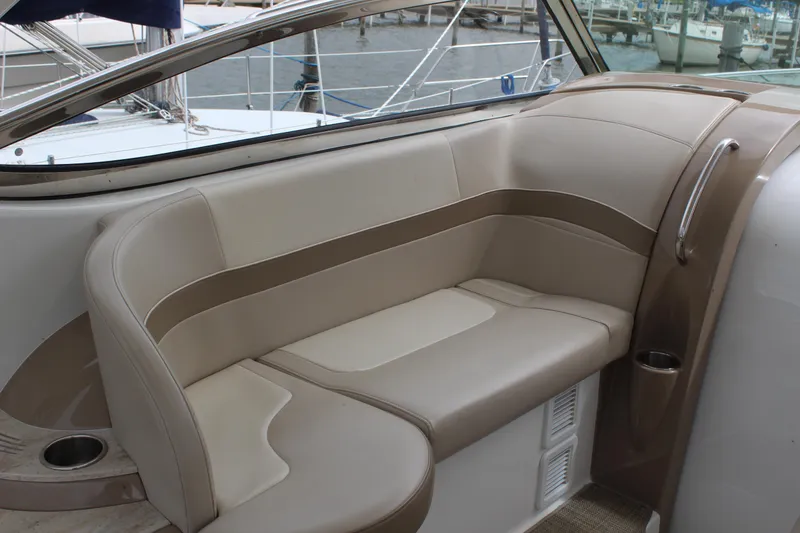 Slide: The Image of Luxurious seating area on a 2016 Formula 37 PC yacht, docked at a marina. - 16