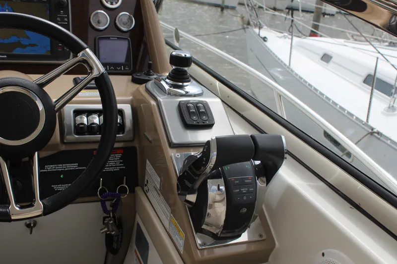 Slide: The Image of Helm of 2016 Formula 37 PC boat with steering wheel and controls. - 18