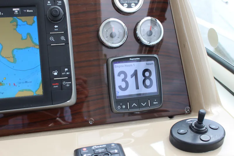 Slide: The Image of Control panel of a 2016 Formula 37 PC boat showing 318 engine hours. - 20