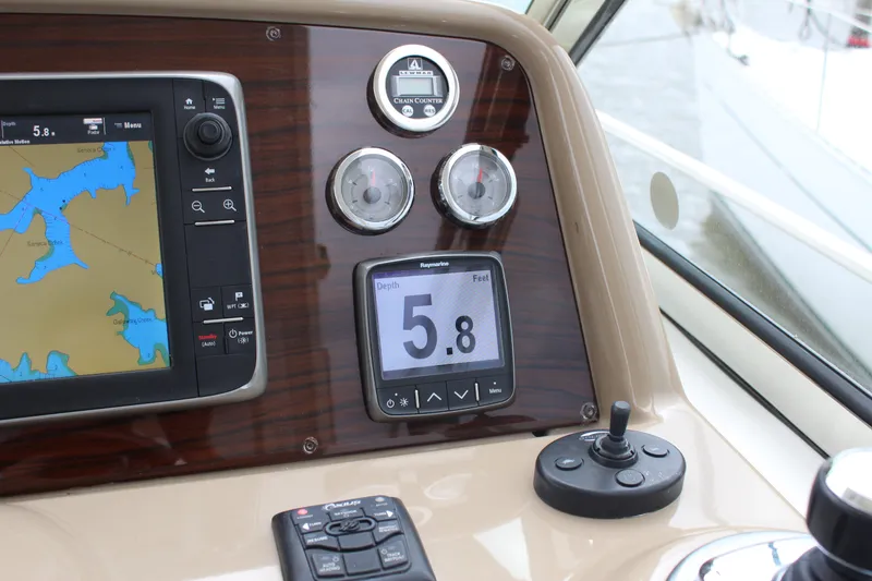 Slide: The Image of Control panel of a 2016 Formula 37 PC boat with navigation and speed displays. - 21