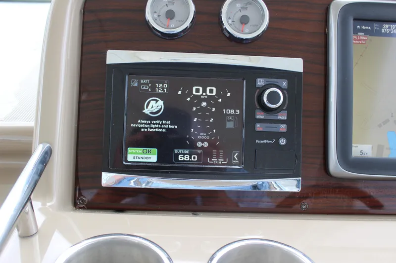 Slide: The Image of Control panel of a 2016 Formula 37 PC boat with navigation display. - 24