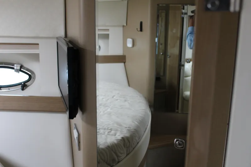 Slide: The Image of Interior of 2016 Formula 37 PC yacht, featuring a cozy bedroom and modern amenities. - 30