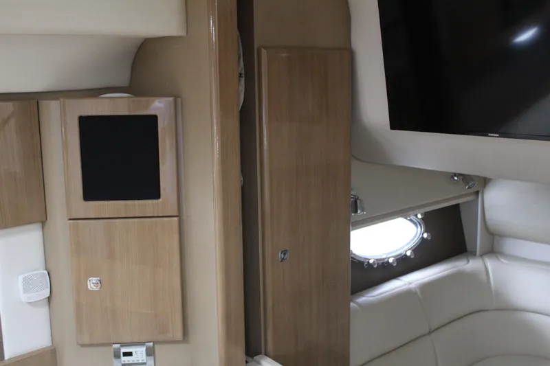 Slide: The Image of Interior of 2016 Formula 37 PC yacht with modern wood paneling and a mounted TV. - 35