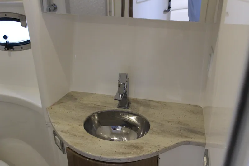 Slide: The Image of 2016 Formula 37 PC yacht bathroom sink with modern faucet and countertop. - 43