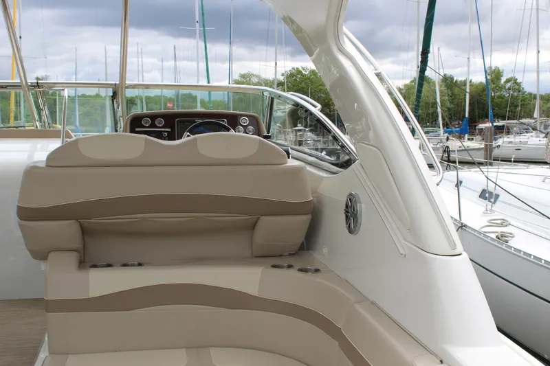 Slide: The Image of 2016 Formula 37 PC yacht interior with beige seating and control panel. - 9