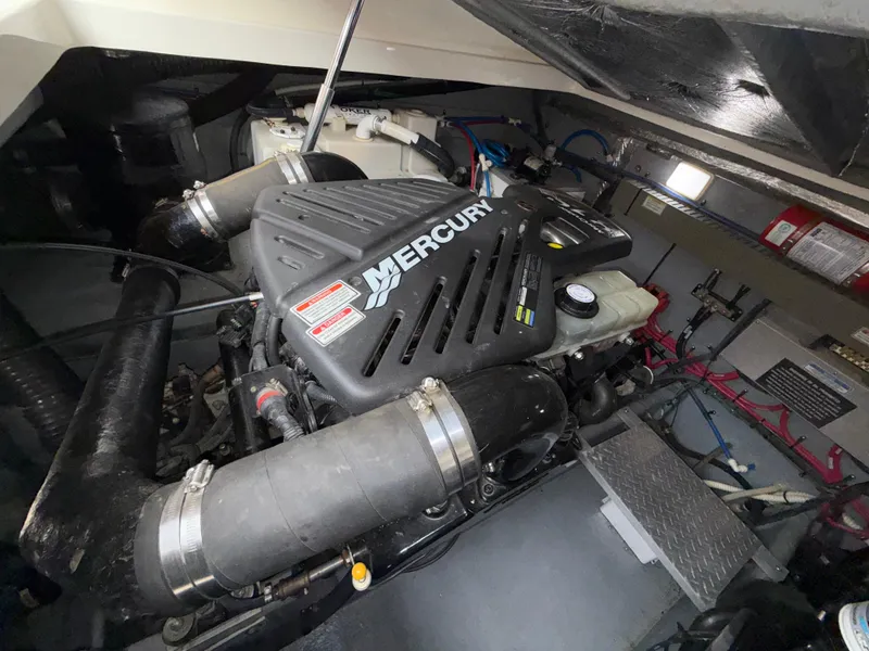 Slide: The Image of Engine compartment of a 2001 Sea Ray 340 Amberjack with Mercury engine. - 28
