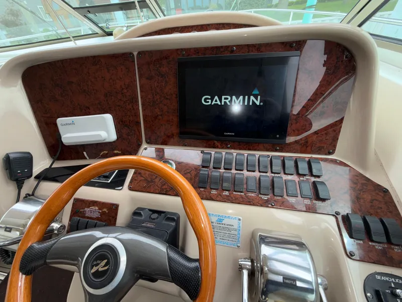 Slide: The Image of Control panel of 2001 Sea Ray 340 Amberjack with Garmin navigation system. - 9