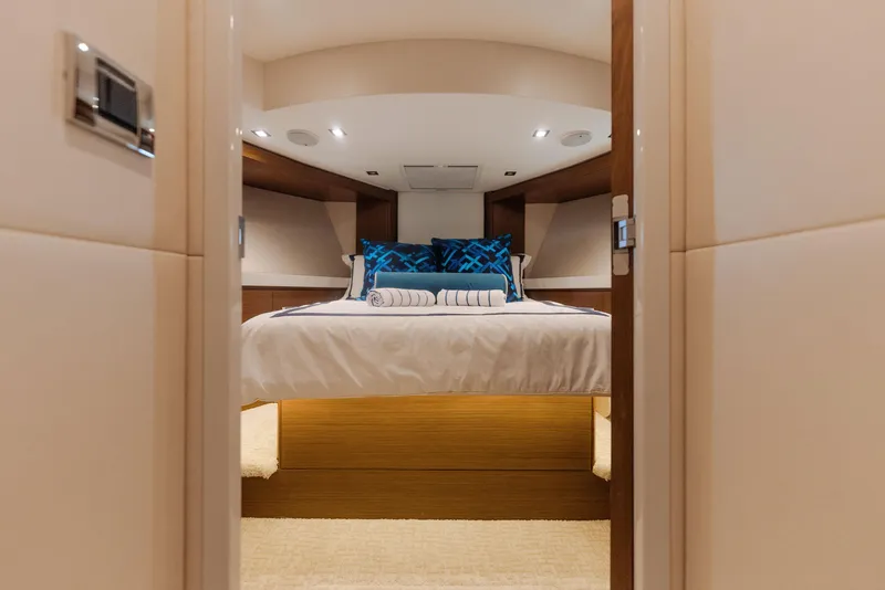 Slide: The Image of Luxurious bedroom interior of 2017 Hatteras M75 Panacera yacht with elegant bedding. - 18