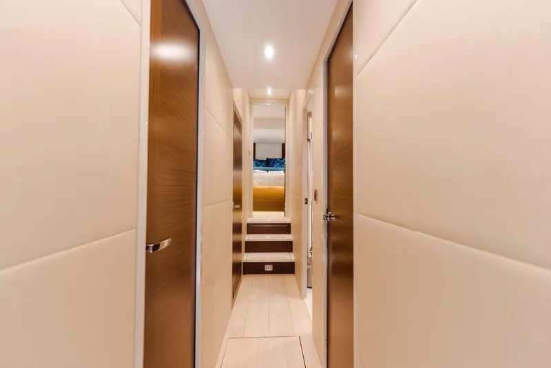 Slide: The Image of Luxurious interior hallway of 2017 Hatteras M75 Panacera yacht with modern design. - 23
