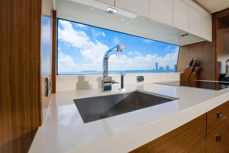 Slide: The Image of Modern kitchen interior on 2017 Hatteras M75 Panacera yacht with ocean view. - 38