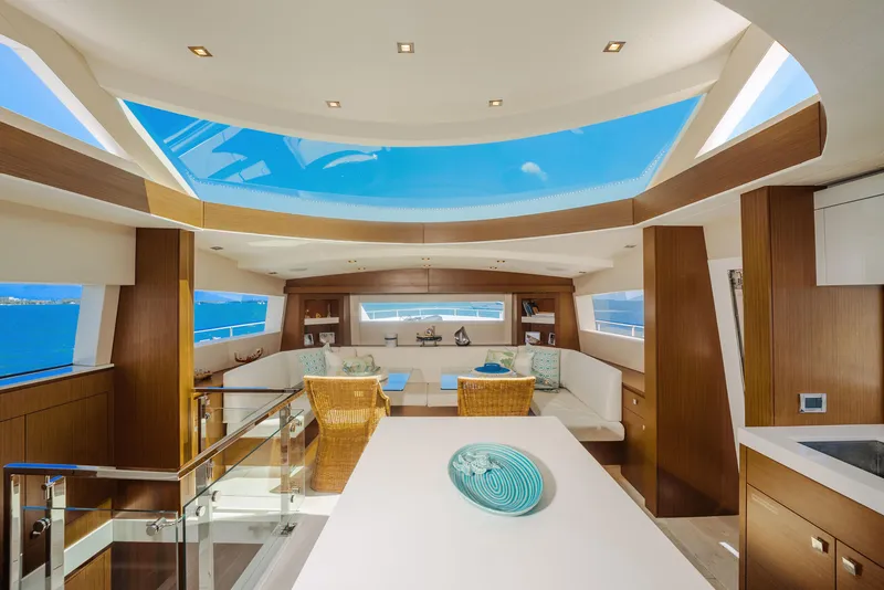 Slide: The Image of Luxurious interior of 2017 Hatteras M75 Panacera yacht with panoramic windows and elegant decor. - 41