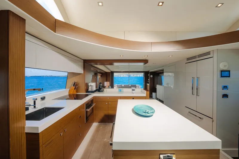 Slide: The Image of Luxurious kitchen interior of 2017 Hatteras M75 Panacera yacht with ocean view. - 44