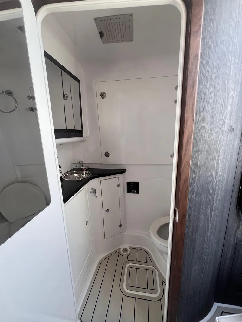 Slide: The Image of 2024 Cigarette 42 Auroris bathroom with sleek design, modern fixtures, and compact layout. - 25