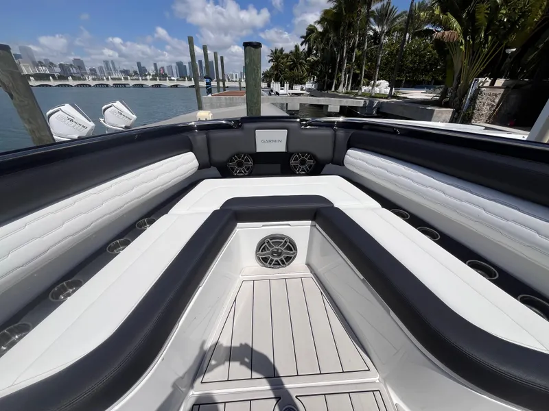 Slide: The Image of 2024 Cigarette 42 Auroris boat interior with sleek seating and waterfront view. - 33