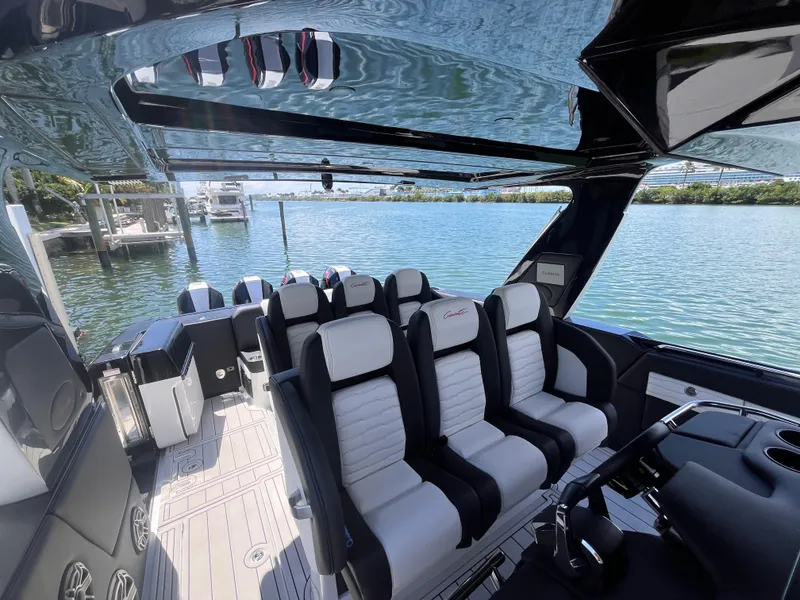 Slide: The Image of 2024 Cigarette 42 Auroris luxury boat interior with sleek seating and modern design. - 5