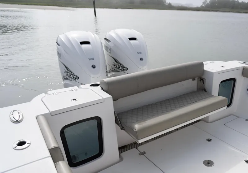 Slide: The Image of 2021 Sportsman Open 322 Center Console with twin V8 engines and rear seating. - 13