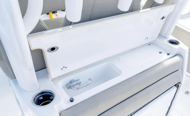 Slide: The Image of 2021 Sportsman Open 322 Center Console interior with seating and storage features. - 14
