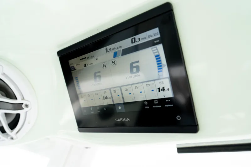 Slide: The Image of Garmin display on 2021 Sportsman Open 322 Center Console boat dashboard. - 6